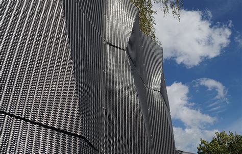 metal fabric cladding|metal cladding for exterior walls.